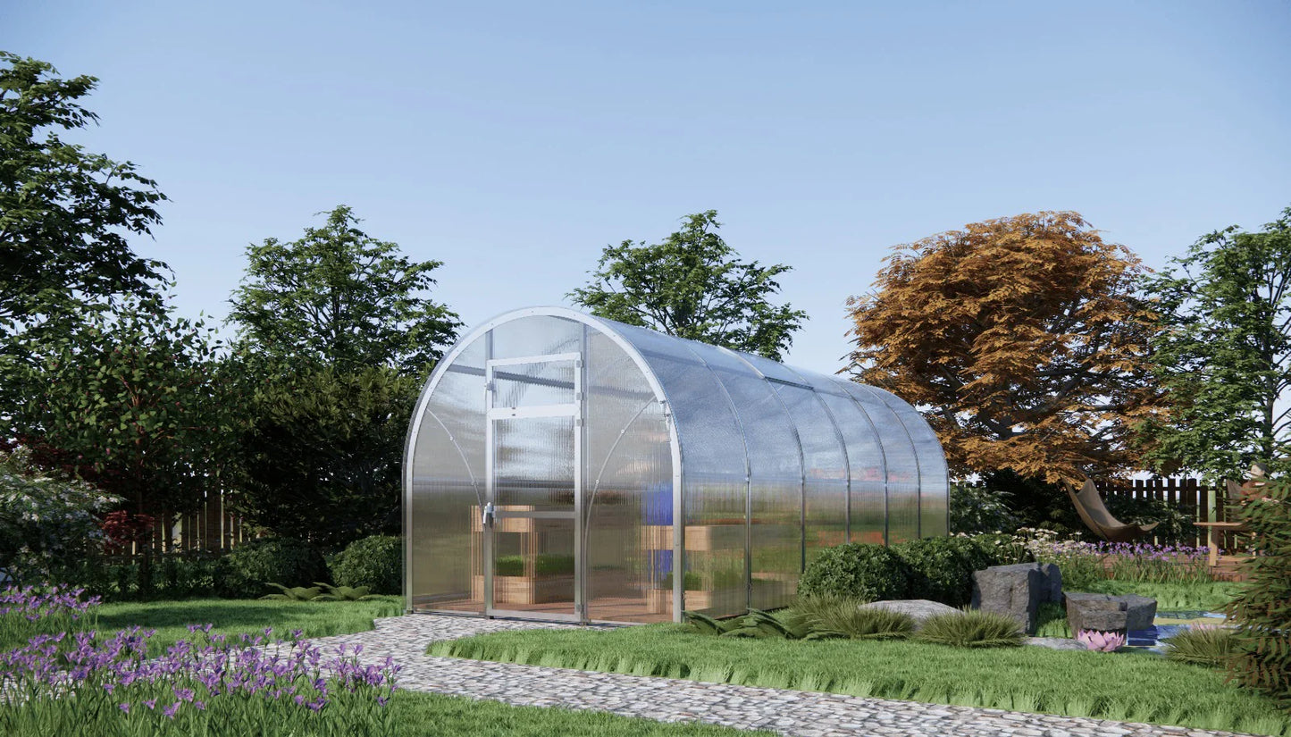 Sigma 250 (Gen III) Greenhouse in a garden with trees and flowers