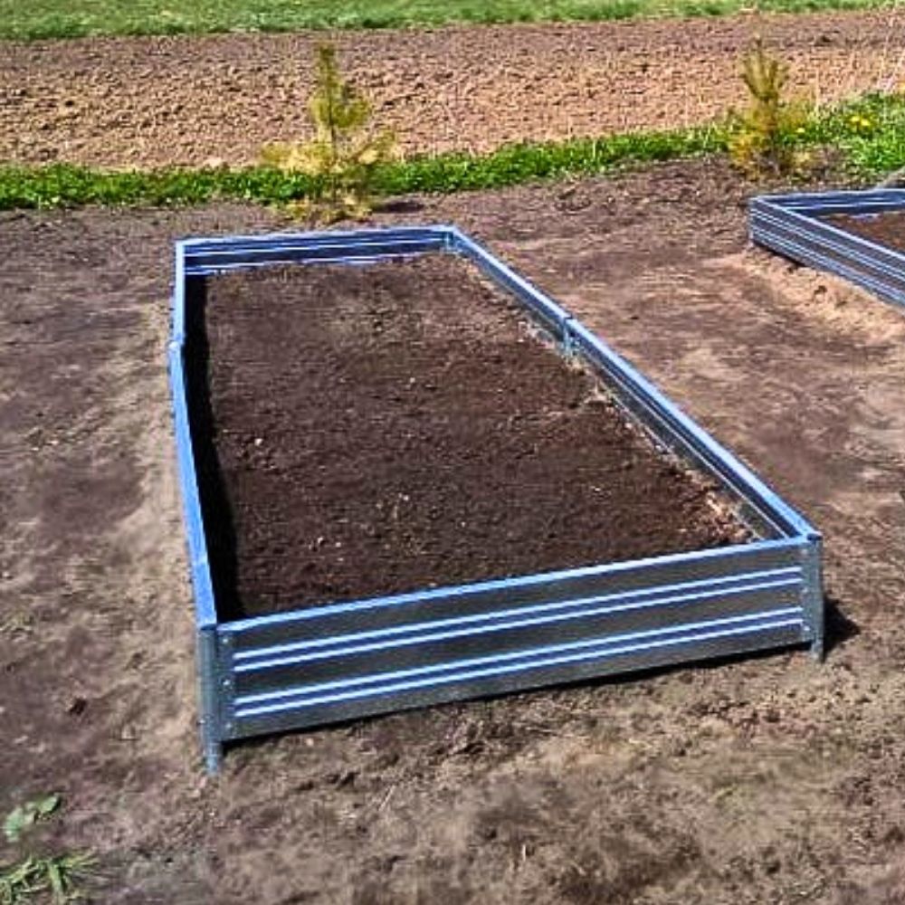 Rectangular metal Planta raised garden bed - 1 tier in a field